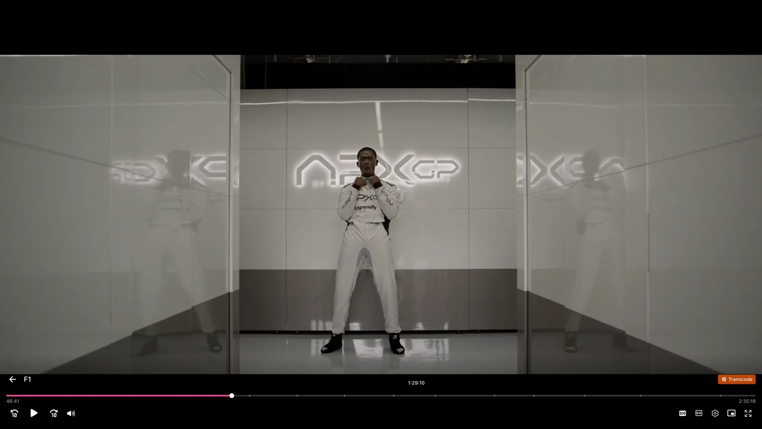 Dubby video player with the on-screen display up — scrub bar, current time, quality badge, and playback controls